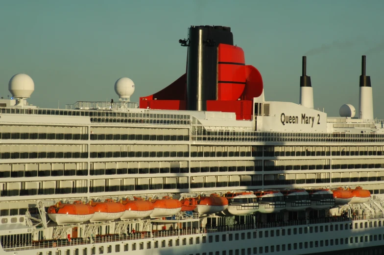 the queen mary is anchored in the water