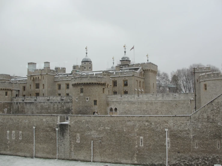 a large building with many towers in the background