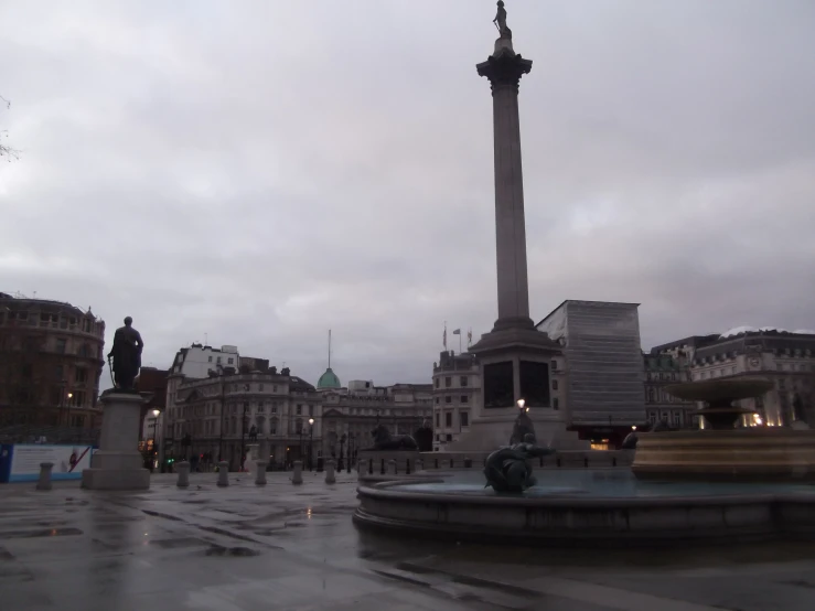 there is a monument with a large pole at the top