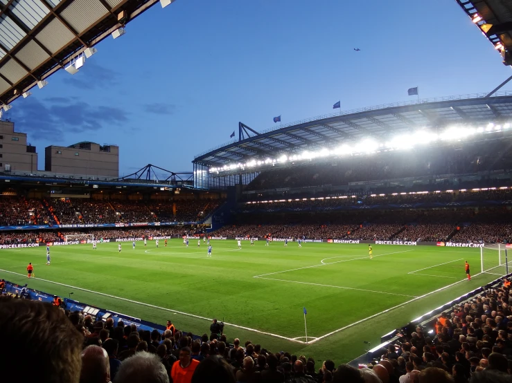 there is a soccer stadium with many fans