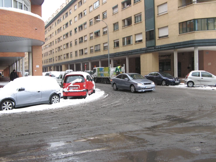 a group of cars parked on top of a road