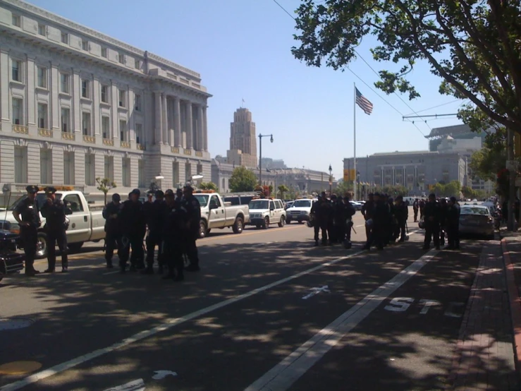 the police are gathered outside on the side of the road