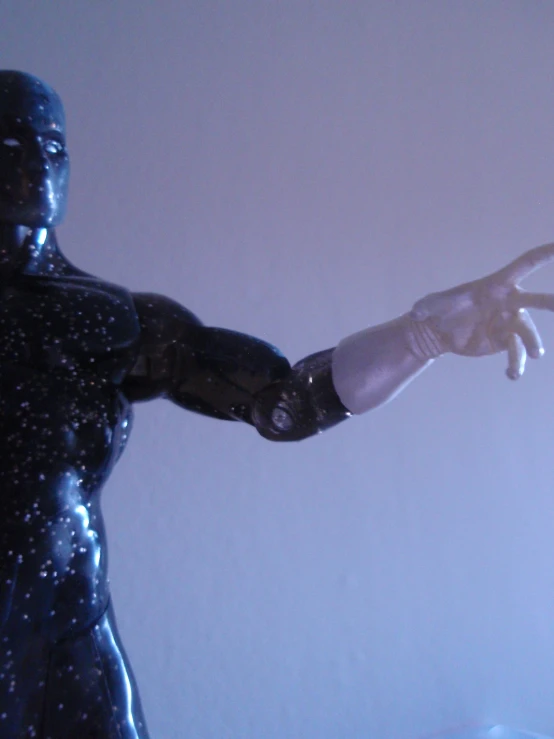 a fake figure holding hands with his body made from bubble