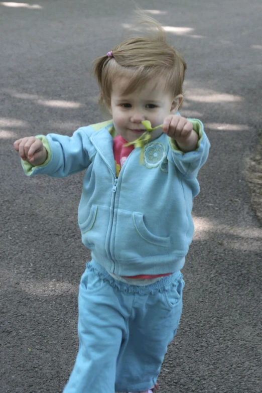 a  on a skateboard playing with soing