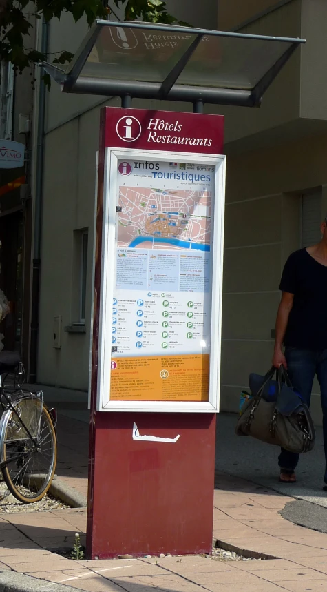 a newspaper stand with a newspaper on the front