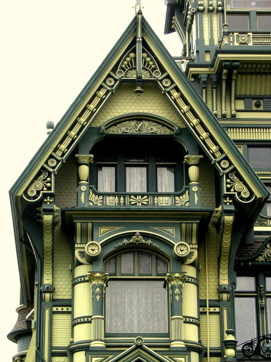 a large house with decorative architecture on top