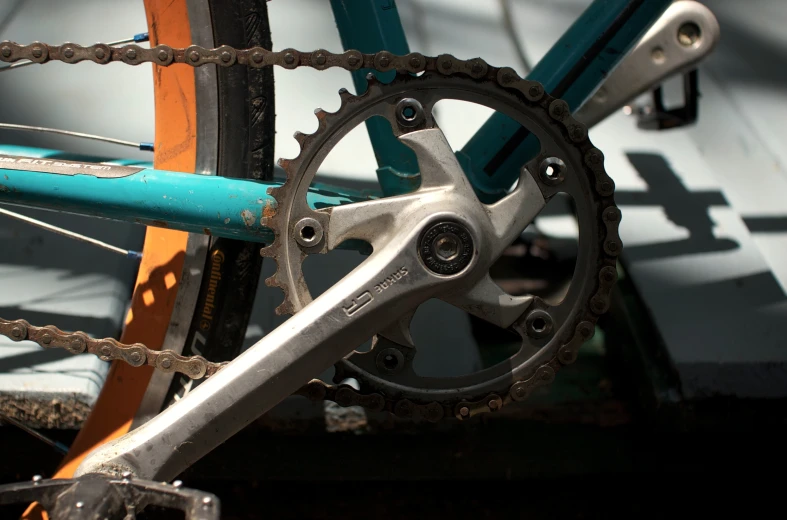 an old bicycle chain and sprocking gear