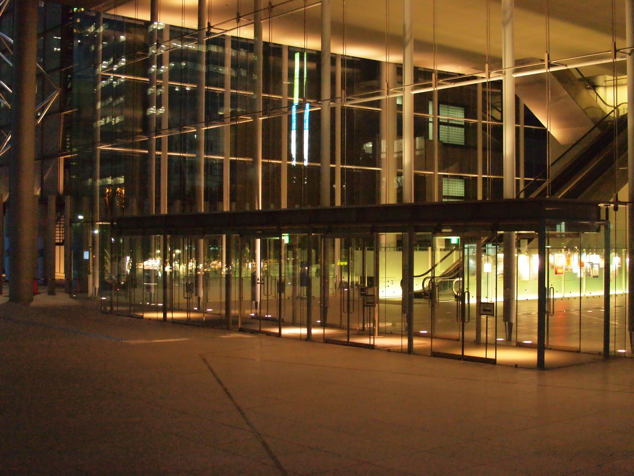 a view of an airport with a glass front entrance