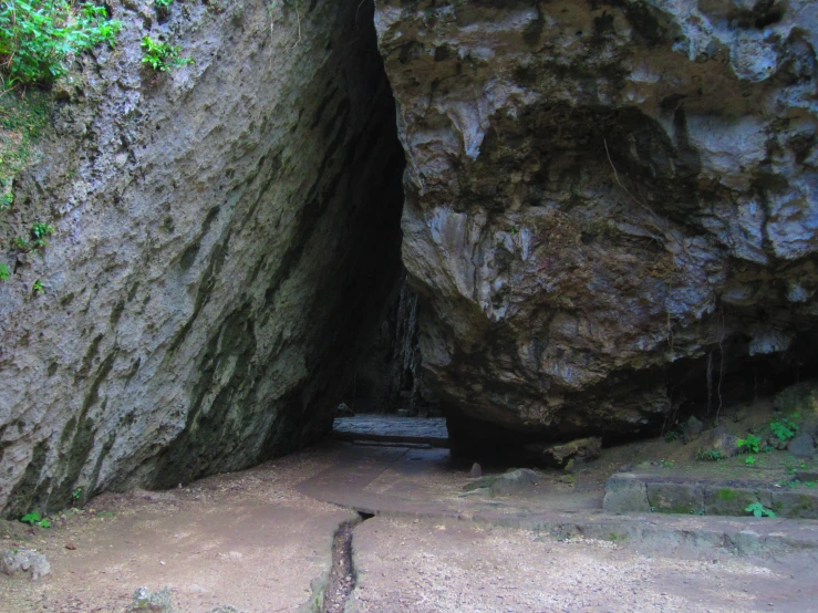 a narrow rock tunnel on the ground