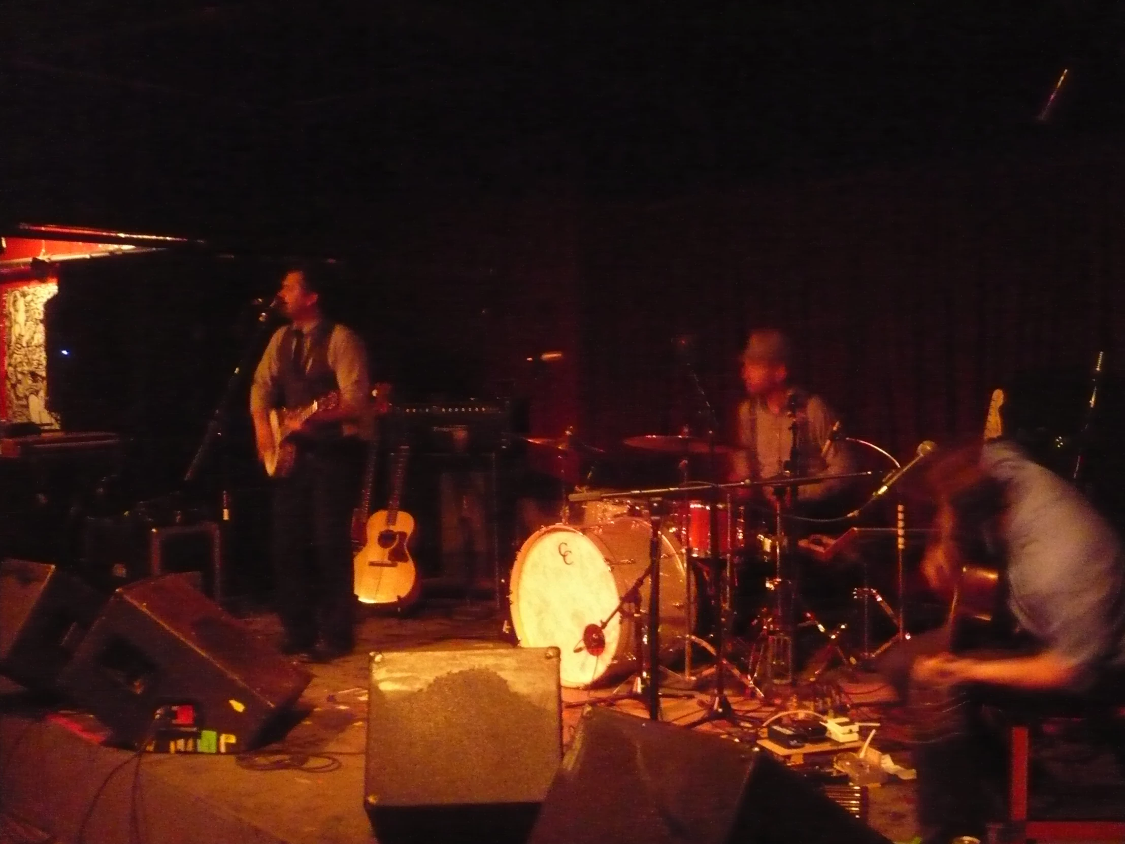 group of men in a dimly lit studio