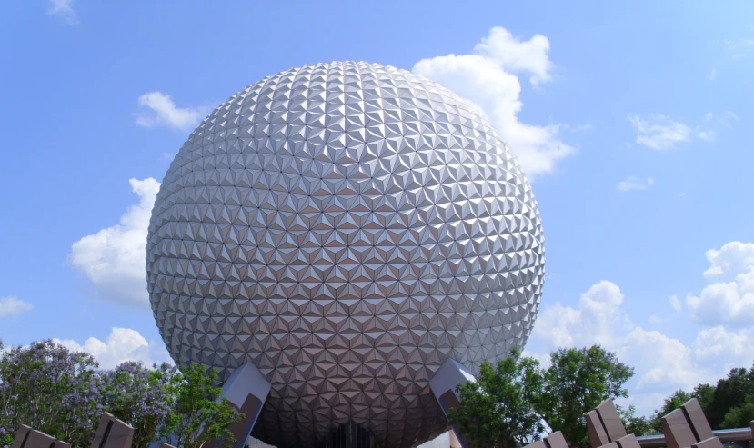 the epcot building with the sky in the background