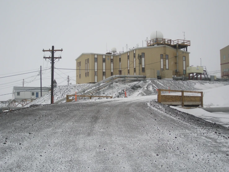 the hill is covered in snow on a snowy day