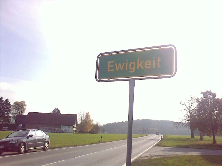 a road sign that is pointing to the left
