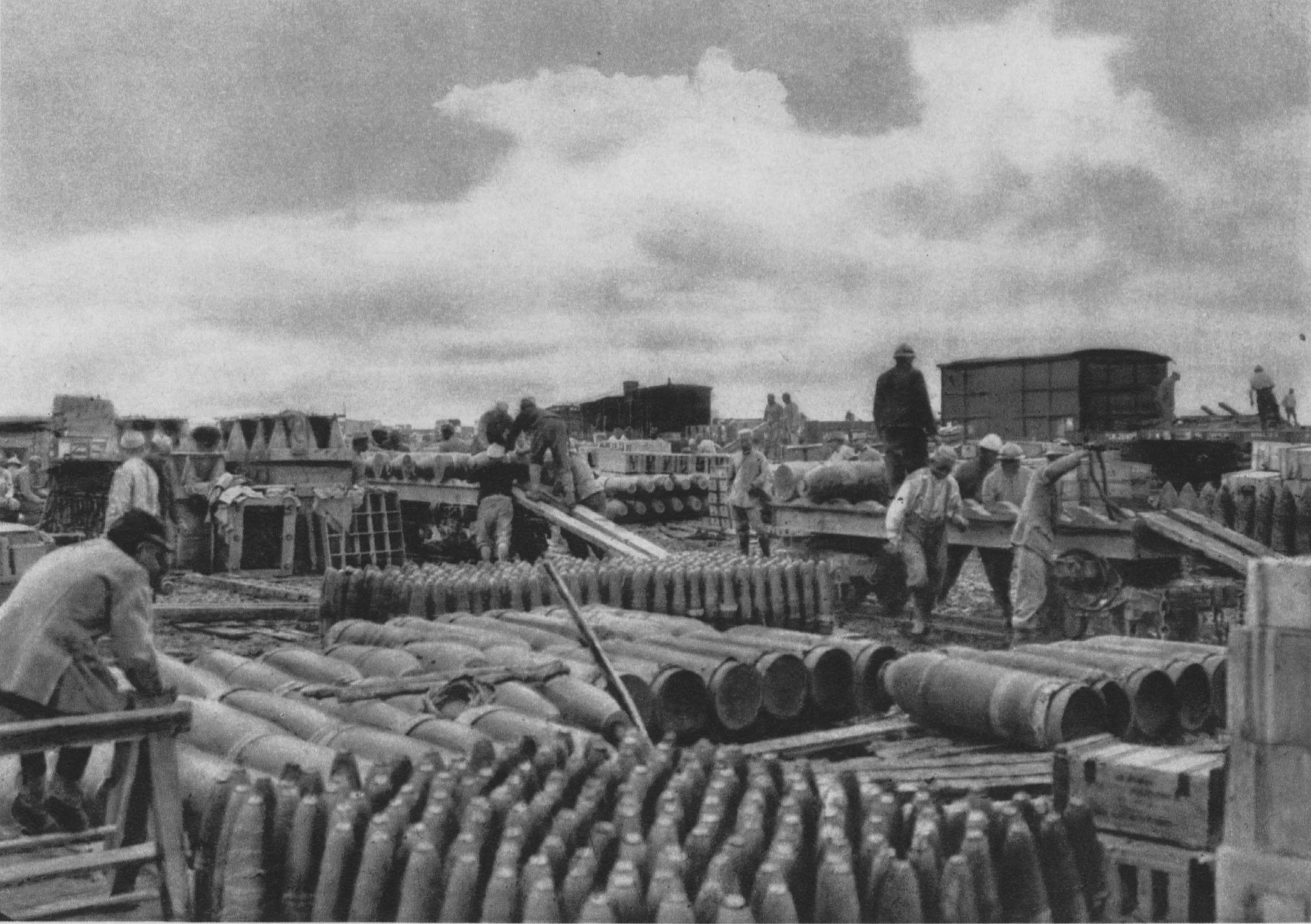 there are several people working on pipe at the factory