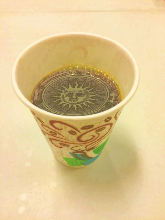 an empty cup with a weird pattern in the inside