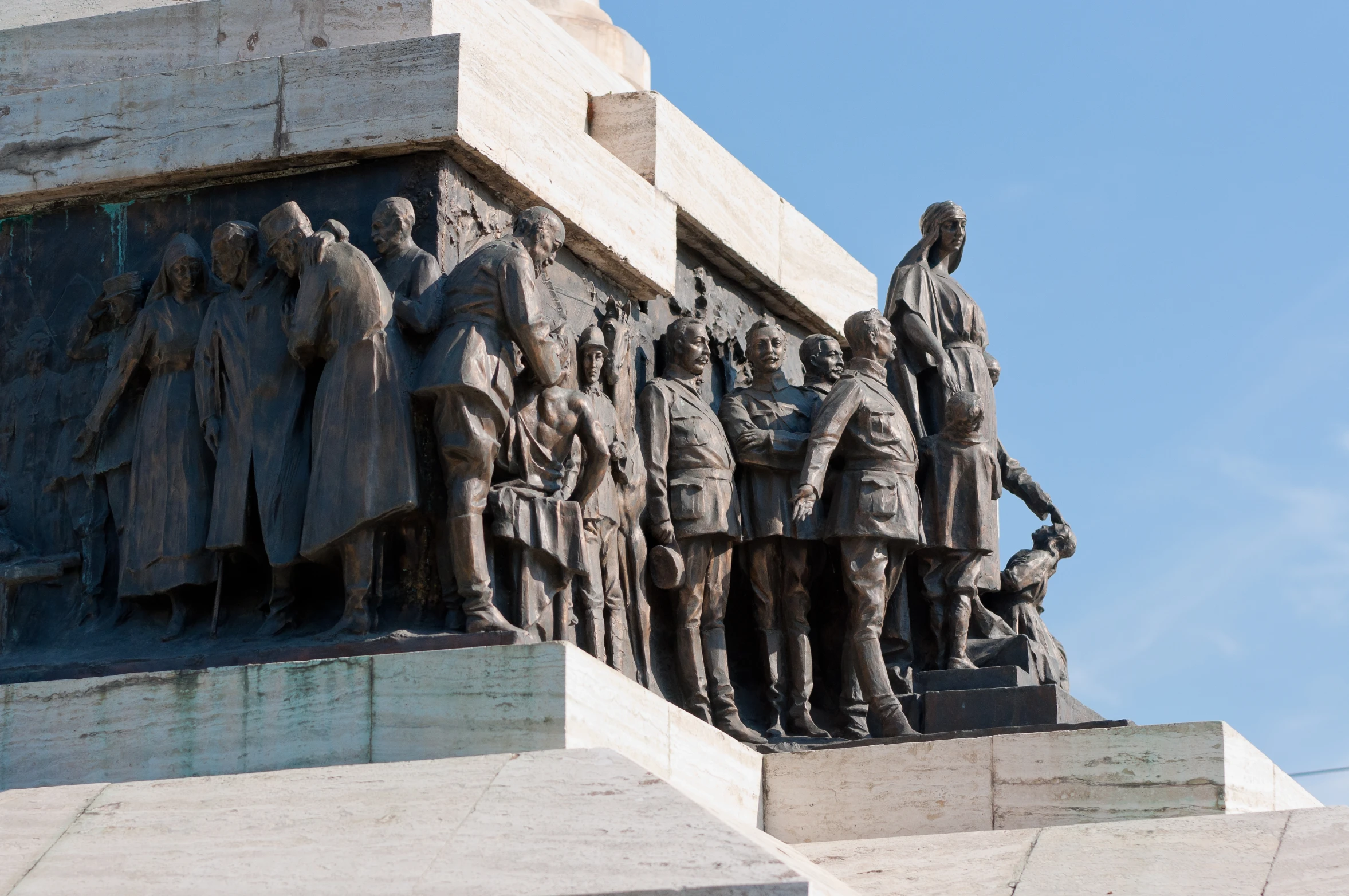 a statue of soldiers standing near other statues