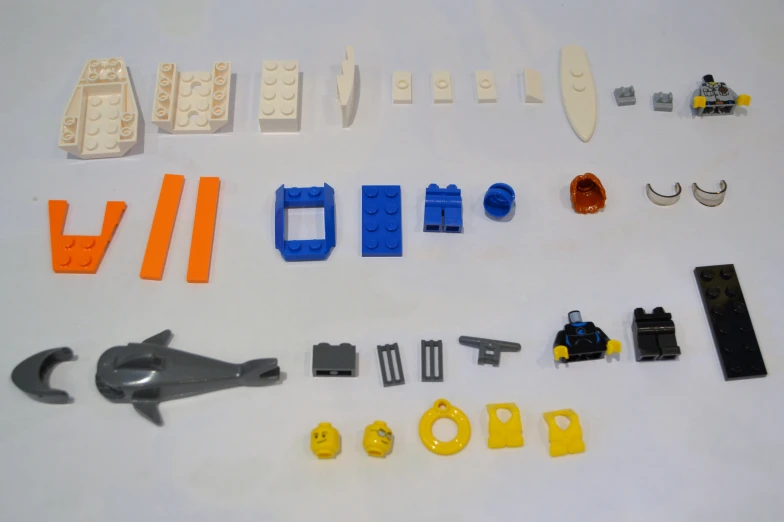 several legos with construction tools and parts that include