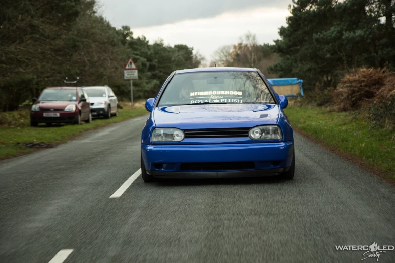 a car that is sitting in the street