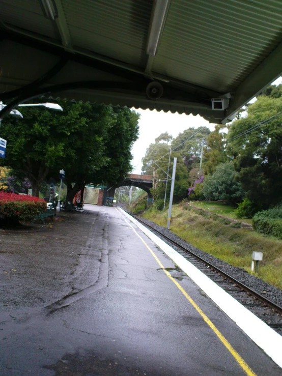 a train yard, with its train tracks running parallel