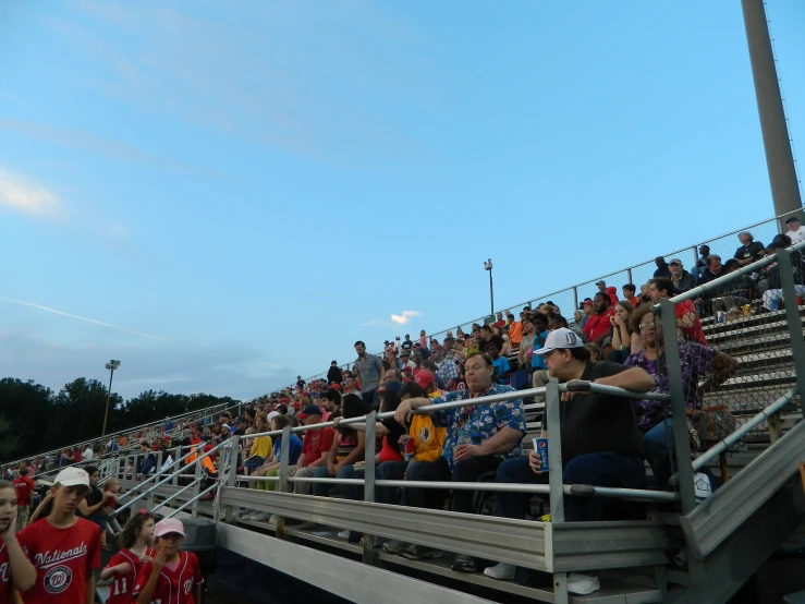 a crowd of people at a football stadium