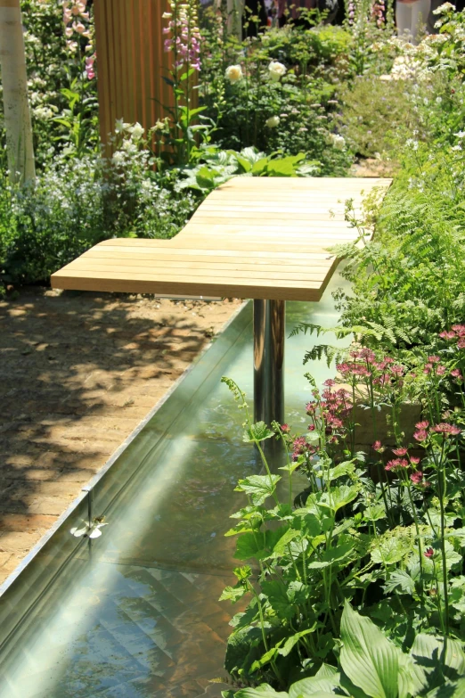 a wooden table sitting on top of a patio