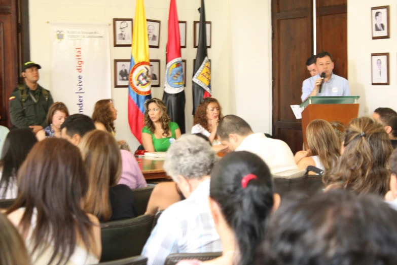 a man giving a presentation to a group of people