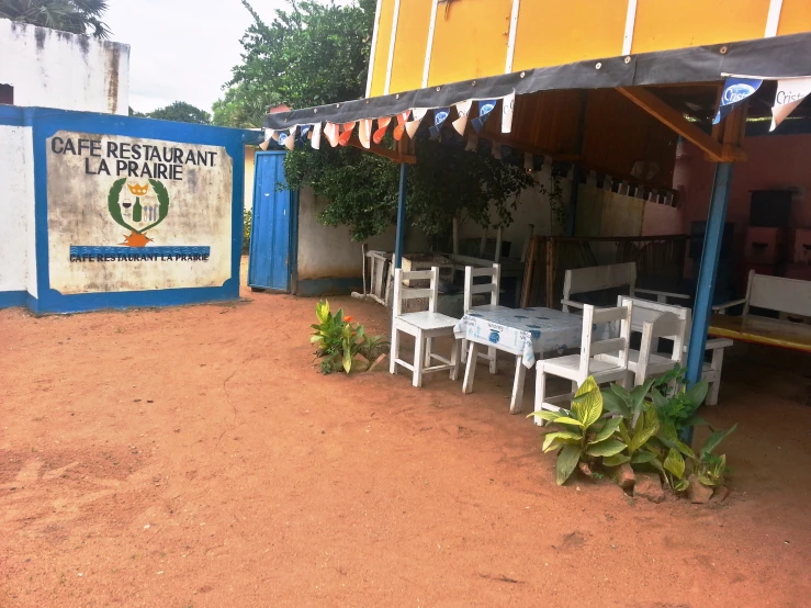 this is a restaurant outside in the dirt