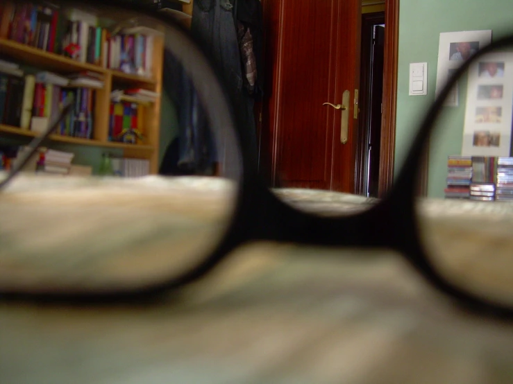 a view through a pair of glasses in a room