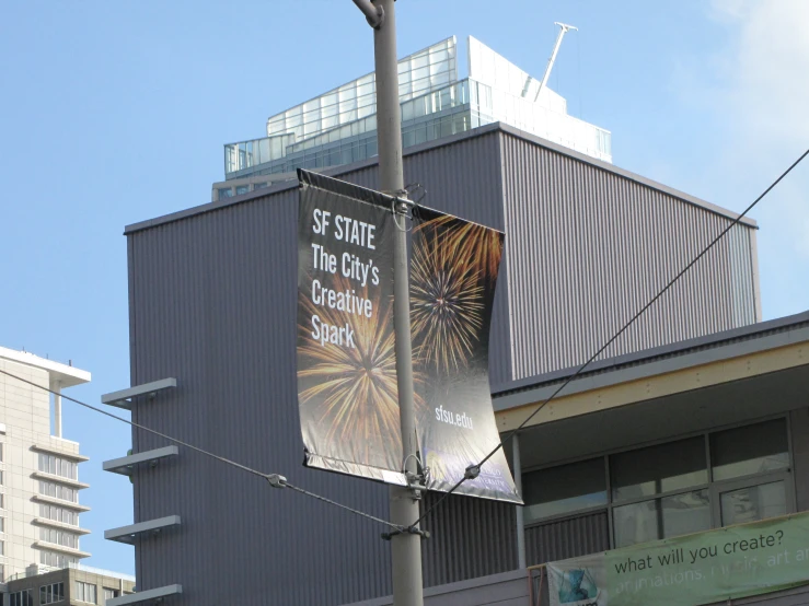 a sign for a science liry on a street light