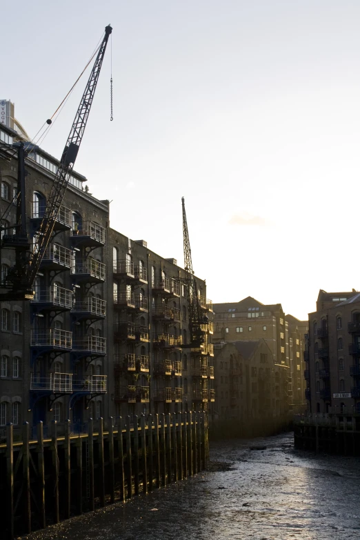 a building that has a crane standing over it