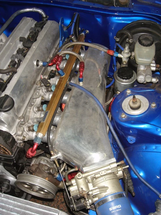 the engine compartment of a small vehicle is shown