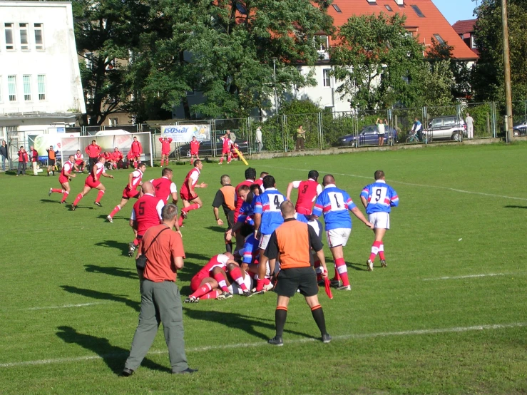 a group of people are on the field