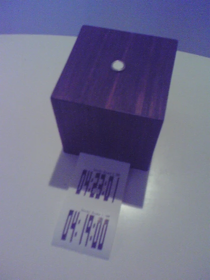 a purple box sitting on top of a white table