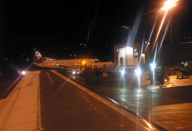 two airplane on the runway at night time