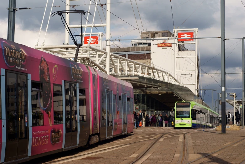 a train parked in the tracks at a station