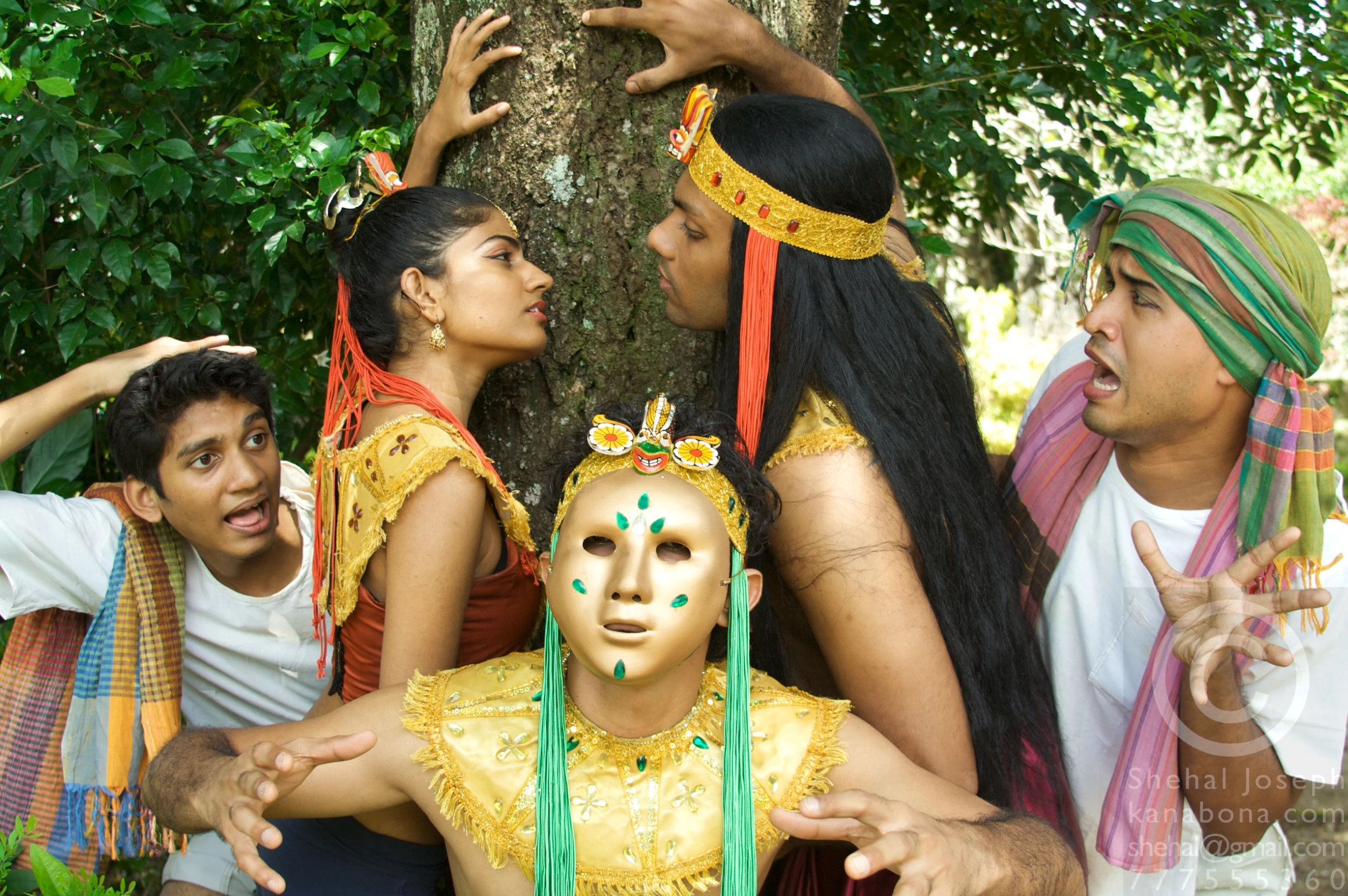 several people wearing costumes pose for a po