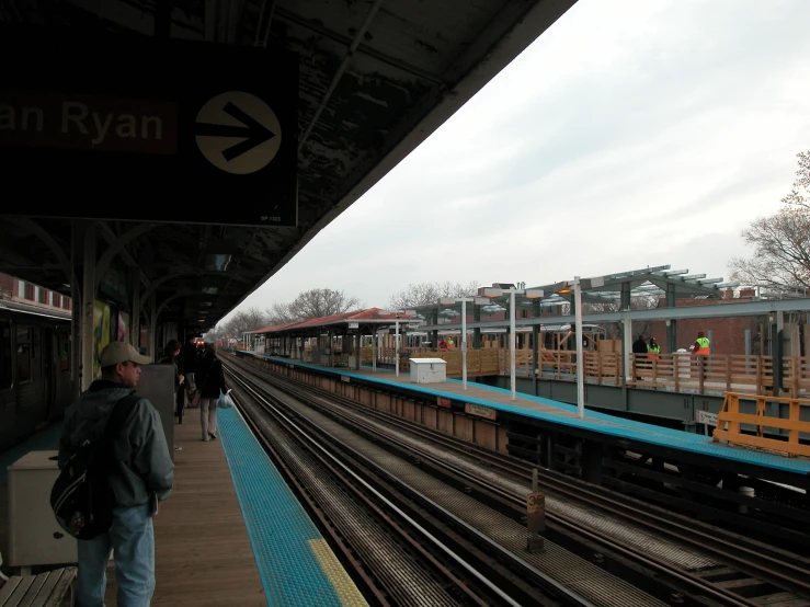 an image of people at a train station