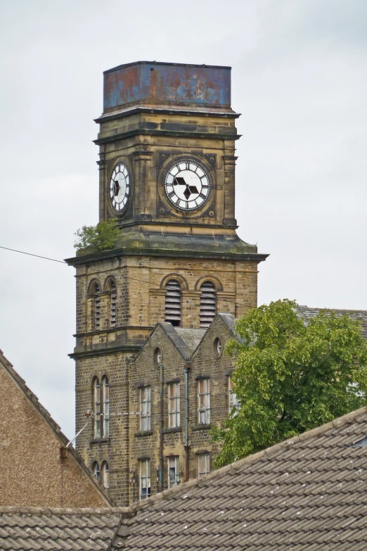 an old brick building with a clock tower