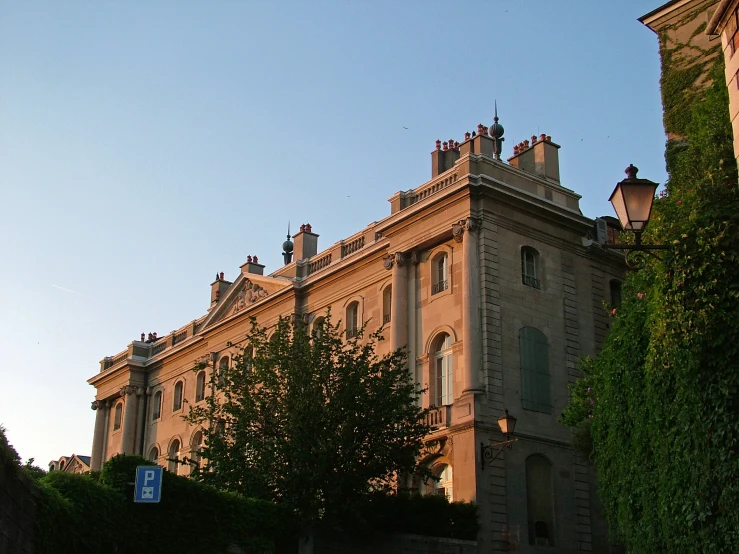 a building on the corner of an outside street