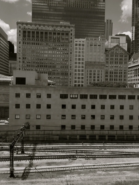 a black and white picture of a train going by