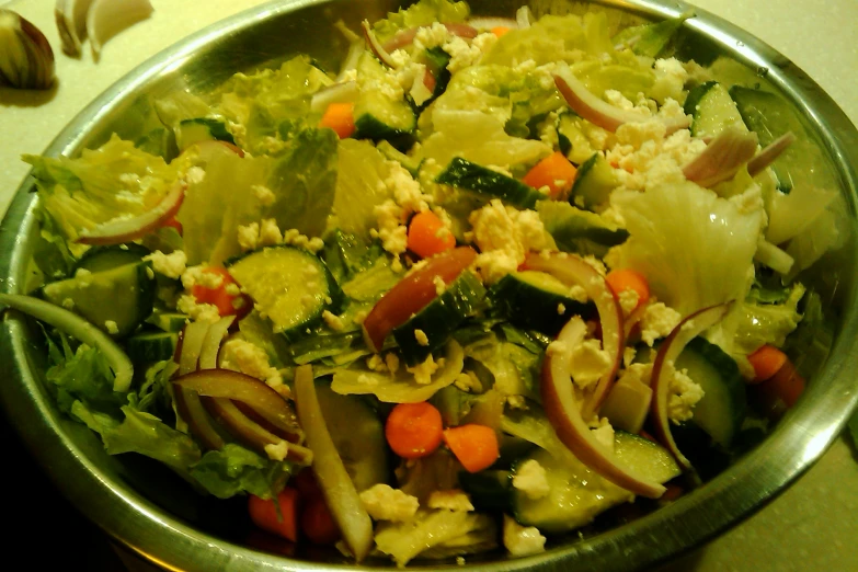 some vegetables and other food in a bowl