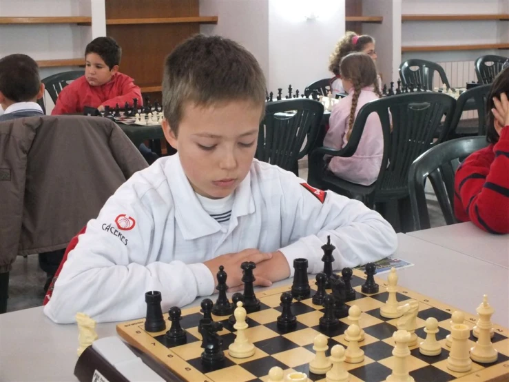 a  playing chess in the restaurant