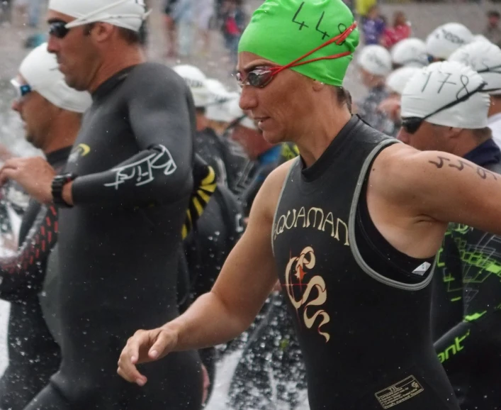 the swimmers are getting wet at the beach