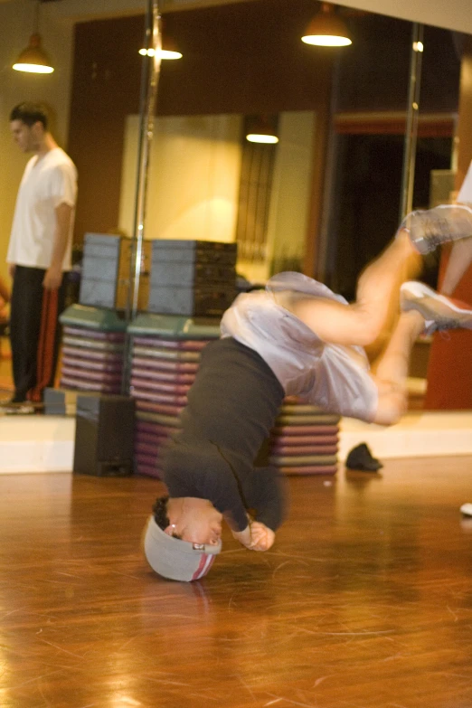 the boys are practicing their moves on their skateboard