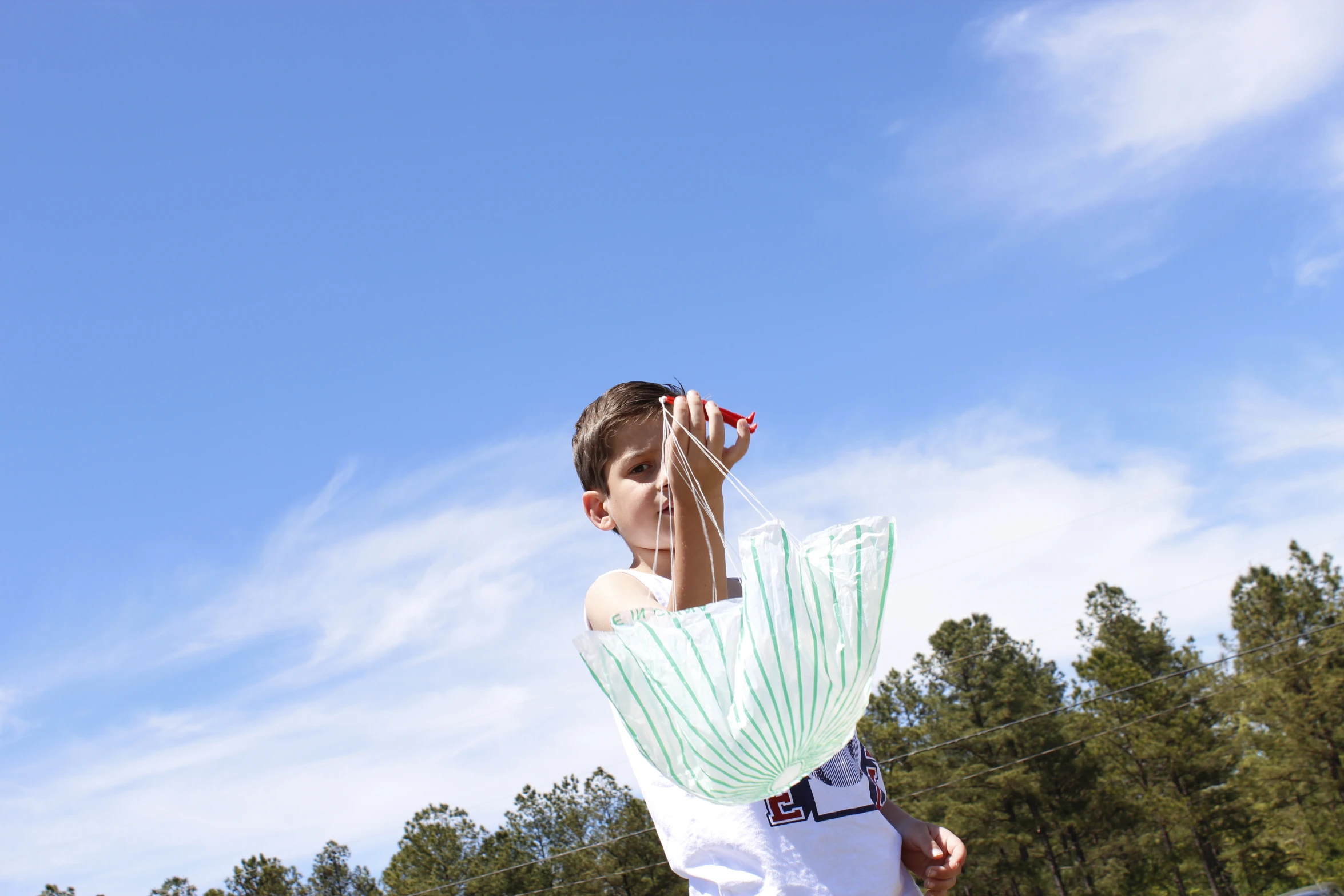 a man in the middle of throwing a frisbee