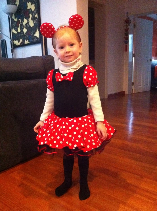 a little girl in her costume for halloween