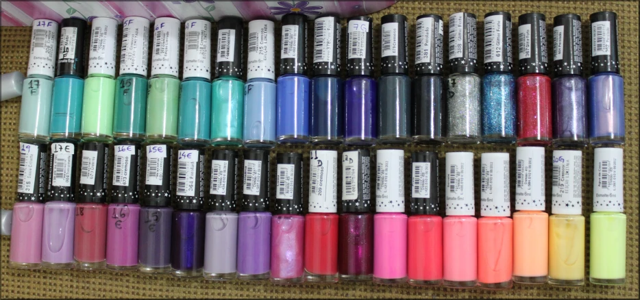 many different colors of water and ink bottles