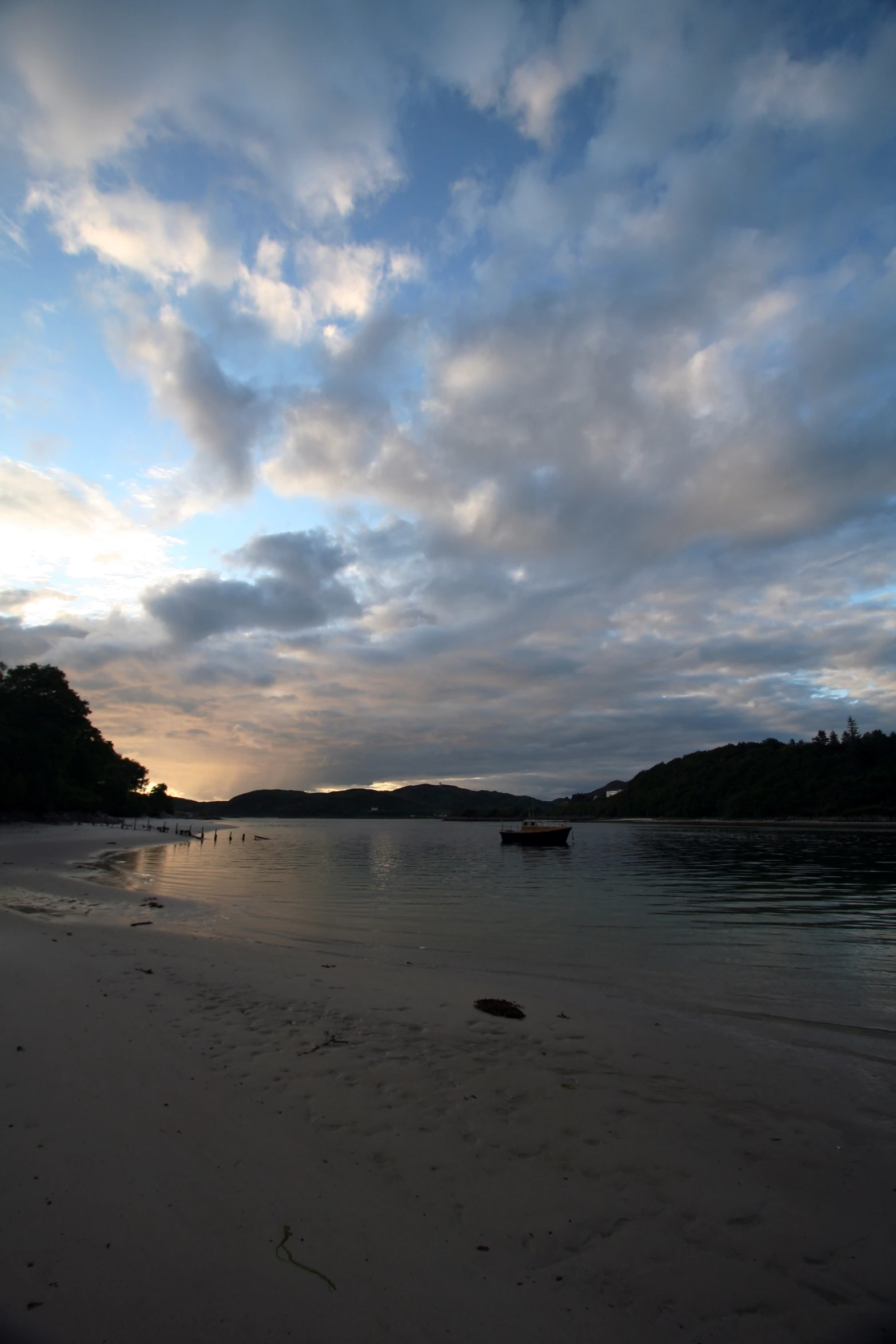 the view from the beach shows the blue and clouds