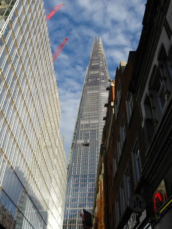 tall buildings and a street with traffic lights in a downtown area