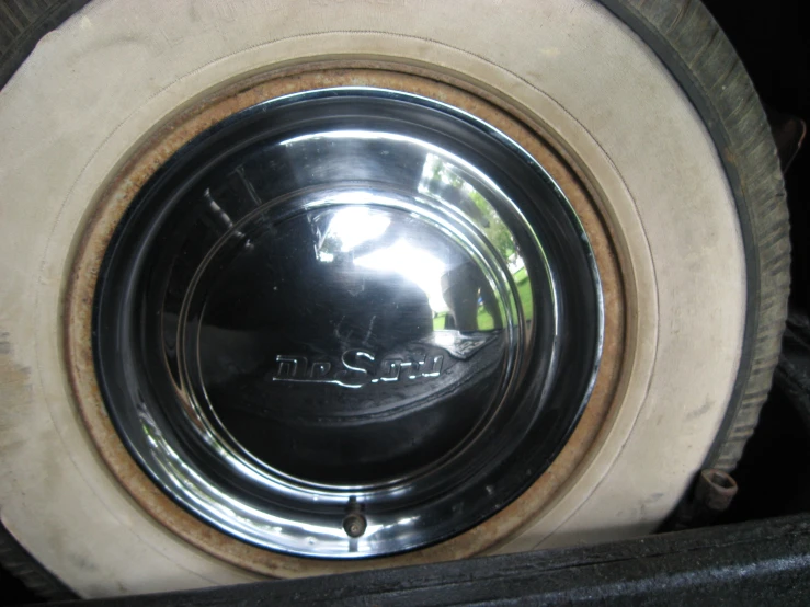 the front of a washing machine with water inside